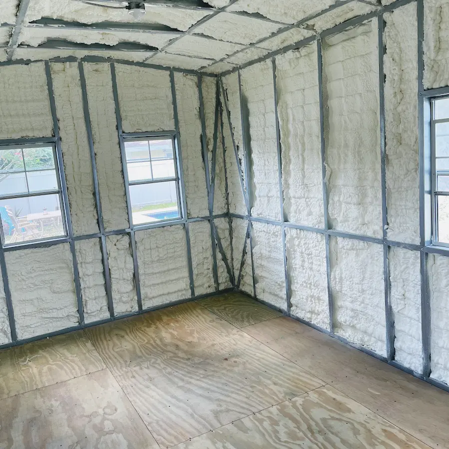 Closed-cell spray foam insulation applied to wall cavities in a residential project in Thornton